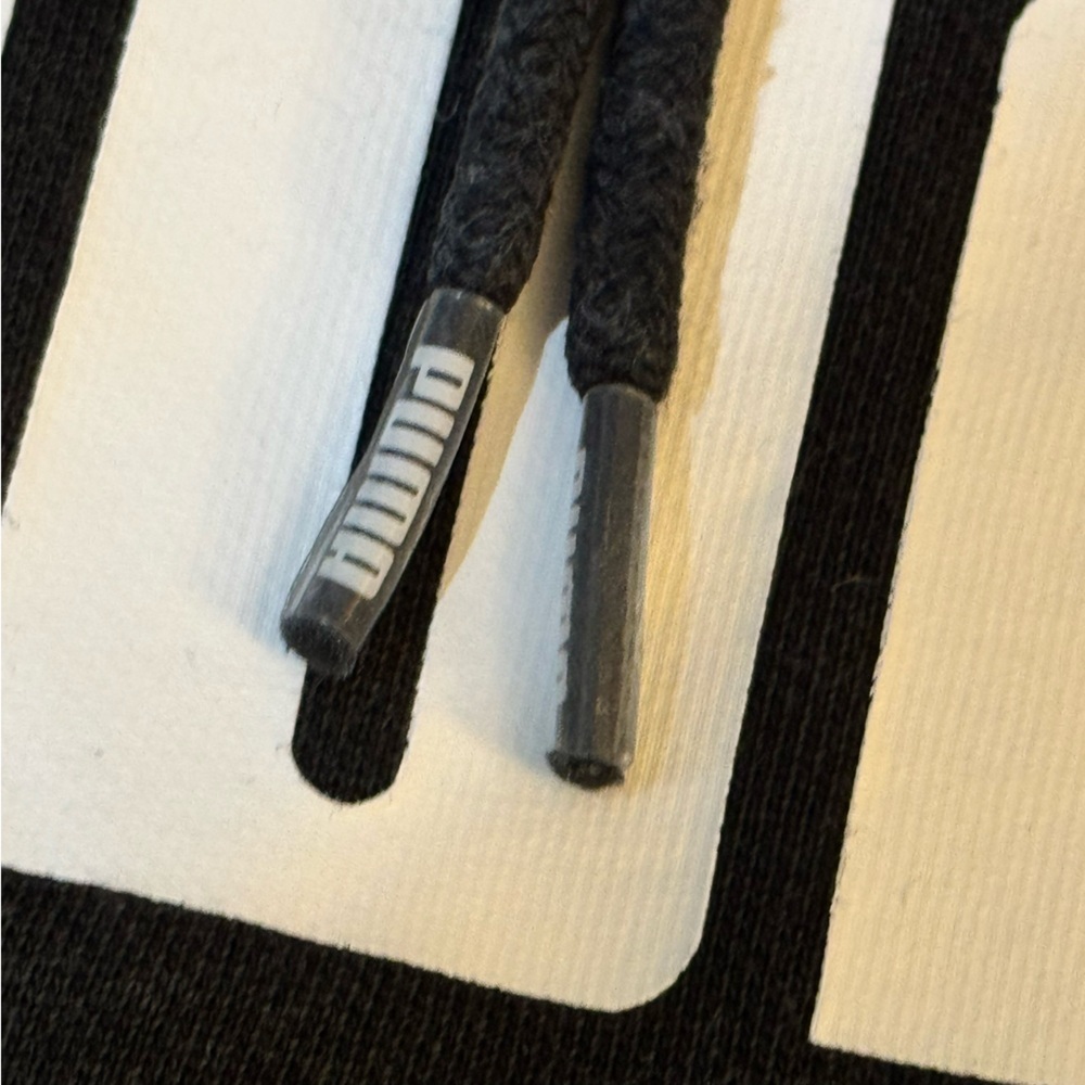 PUMA Black Hoodie with White Logo

#1409 - Picture 6 of 10